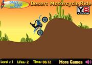 砂漠のオートバイに乗る